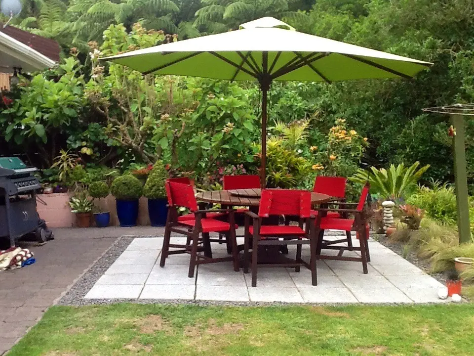 Cream canopy on a wood-frame patio umbrella