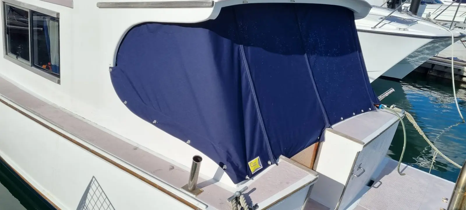 Navy dodger and cockpit cover on a classic launch